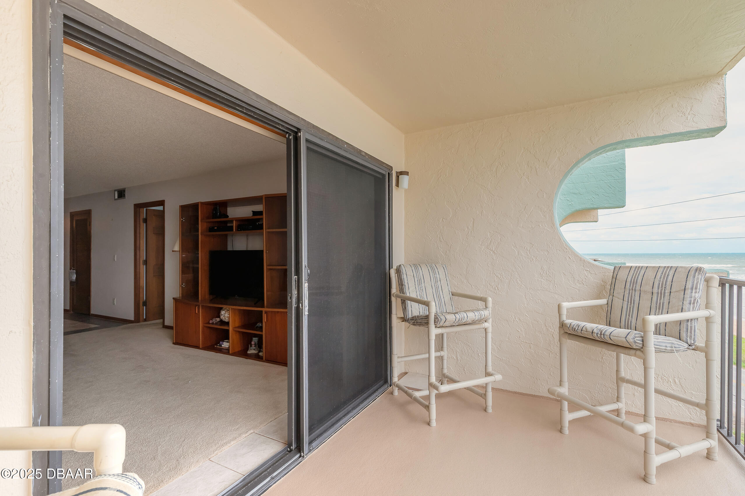 2222 Ocean Shore Boulevard, Unit 402B Ormond Beach, FL 32176 - Photo 7 of 31 a view of room with furniture and closet