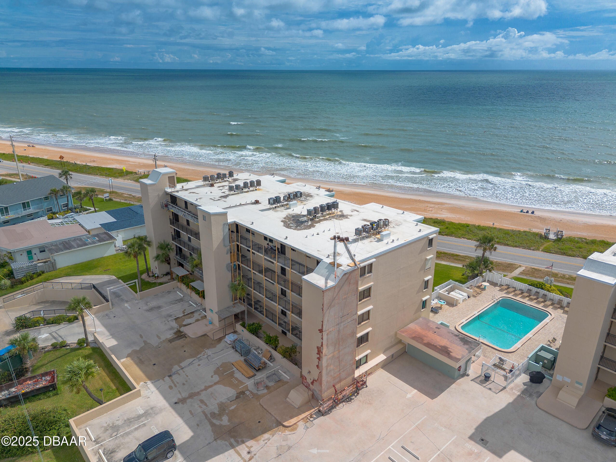 2222 Ocean Shore Boulevard, Unit 402B Ormond Beach, FL 32176 - Photo 8 of 31 a view of a terrace with lawn chairs