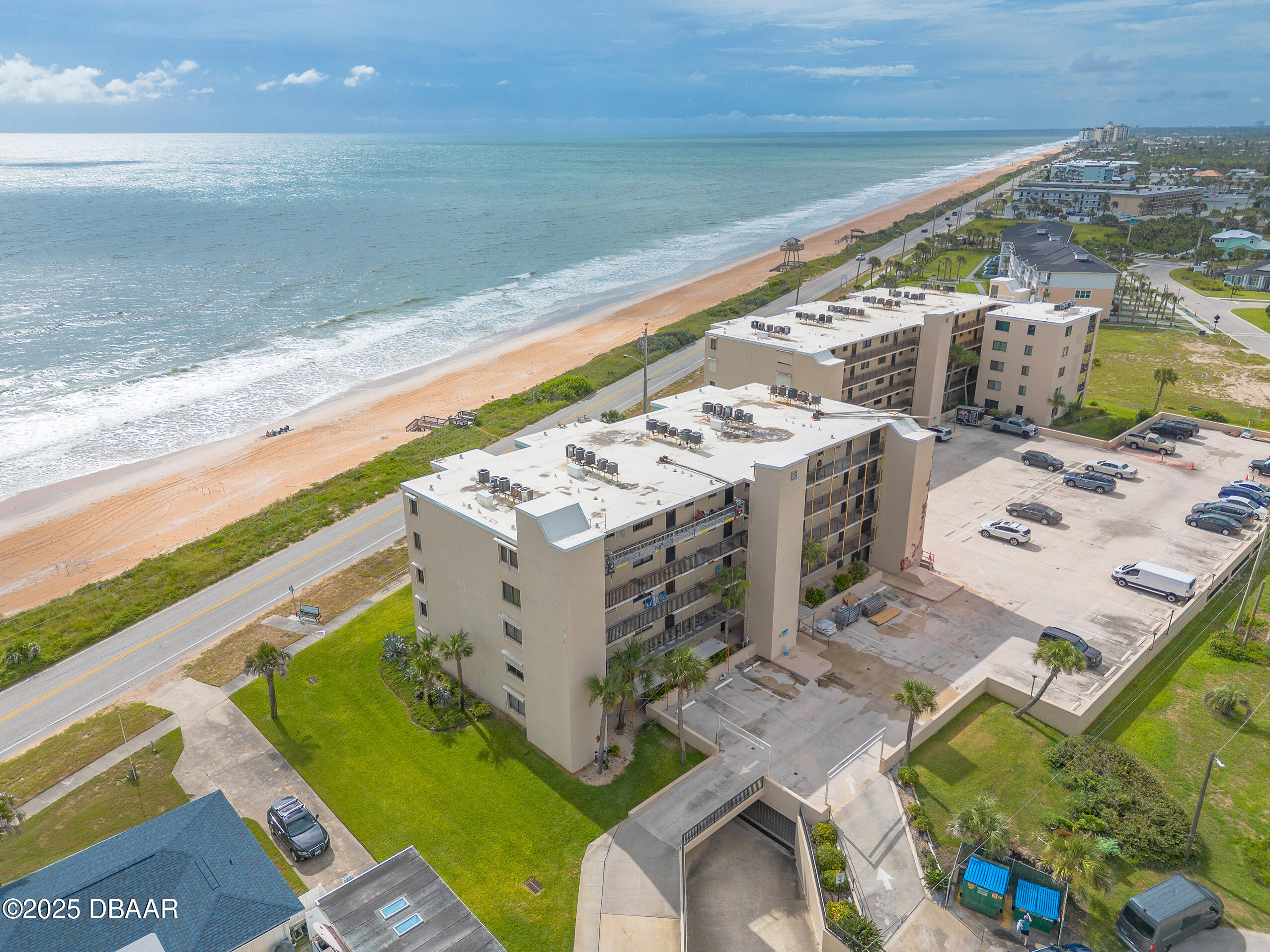 2222 Ocean Shore Boulevard, Unit 402B Ormond Beach, FL 32176 - Photo 10 of 31 a view of a swimming pool with seating area