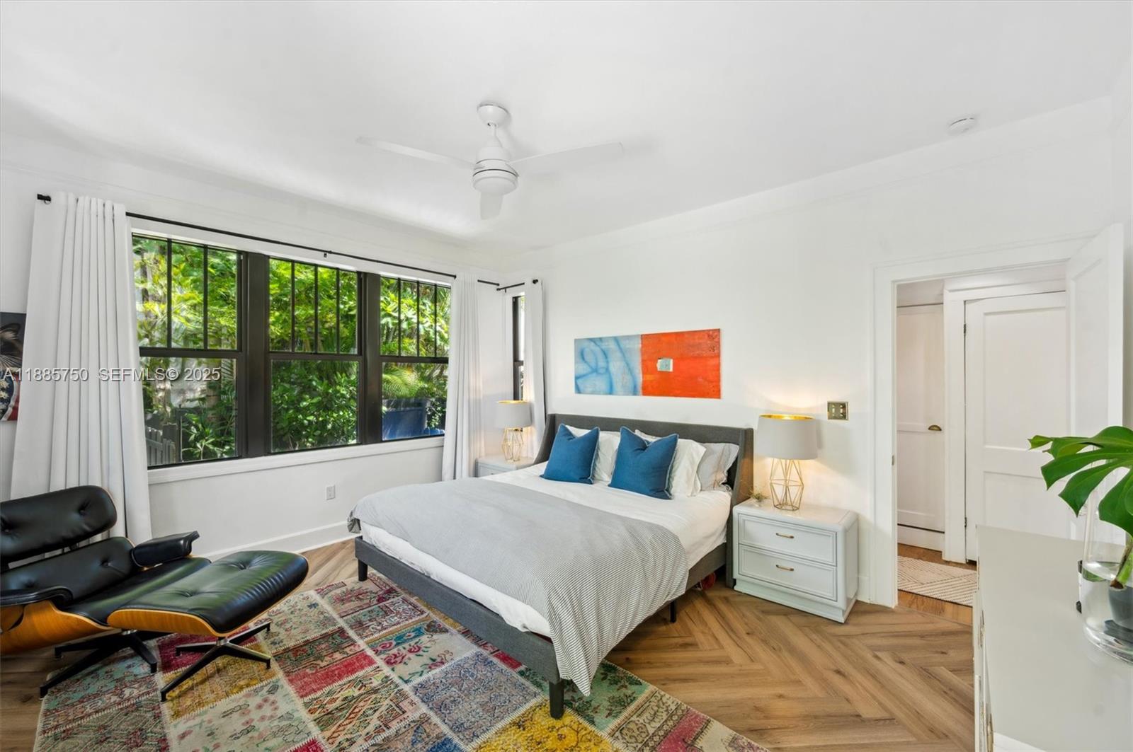 135 Northeast 45th Street Miami, FL 33137 - Photo 19 of 48 a bedroom with a bed and a window