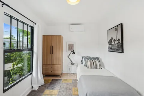 a view of entryway with wooden floor and door