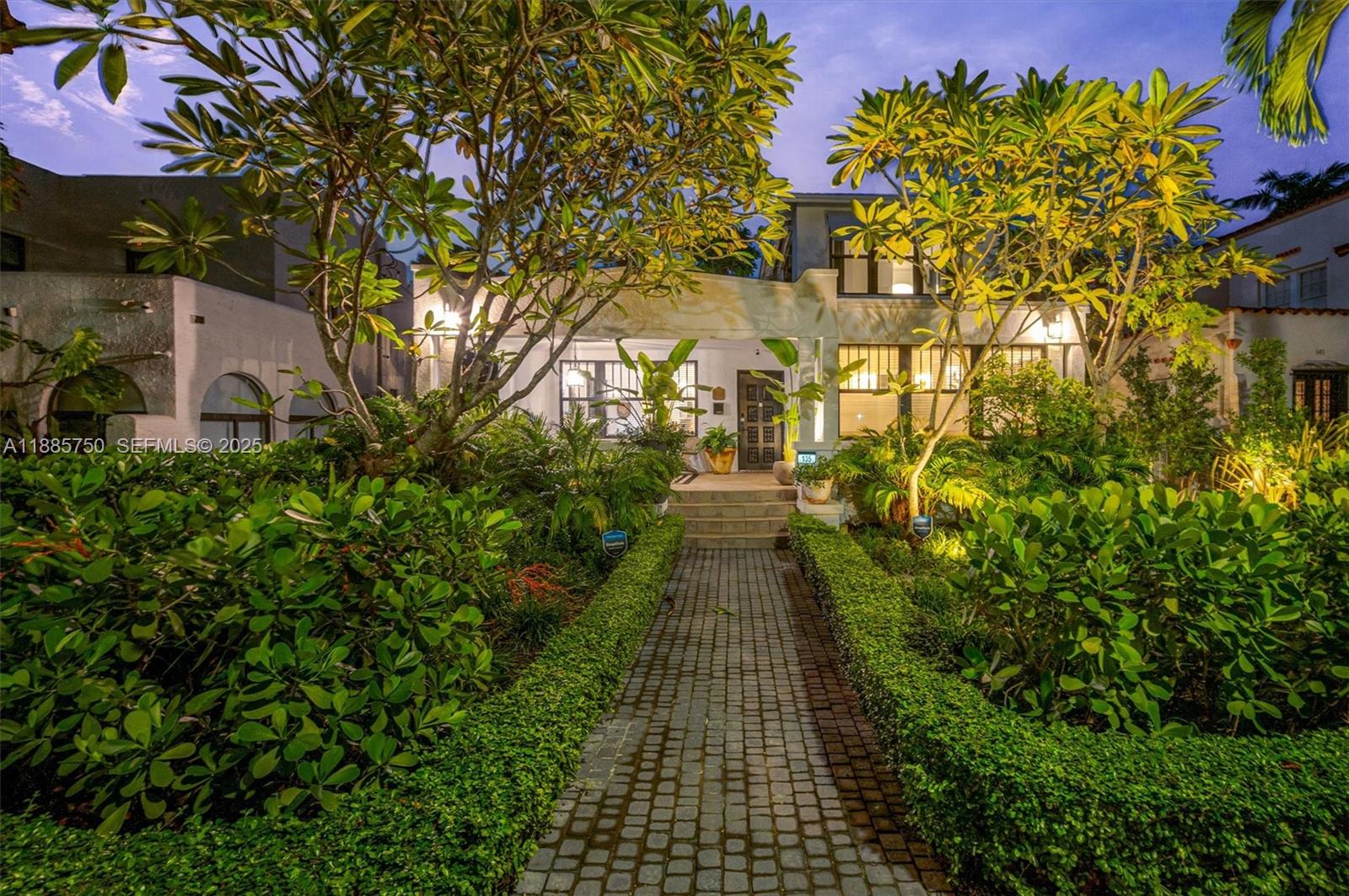 135 Northeast 45th Street Miami, FL 33137 - Photo 45 of 48 a view of a pathway with a yard