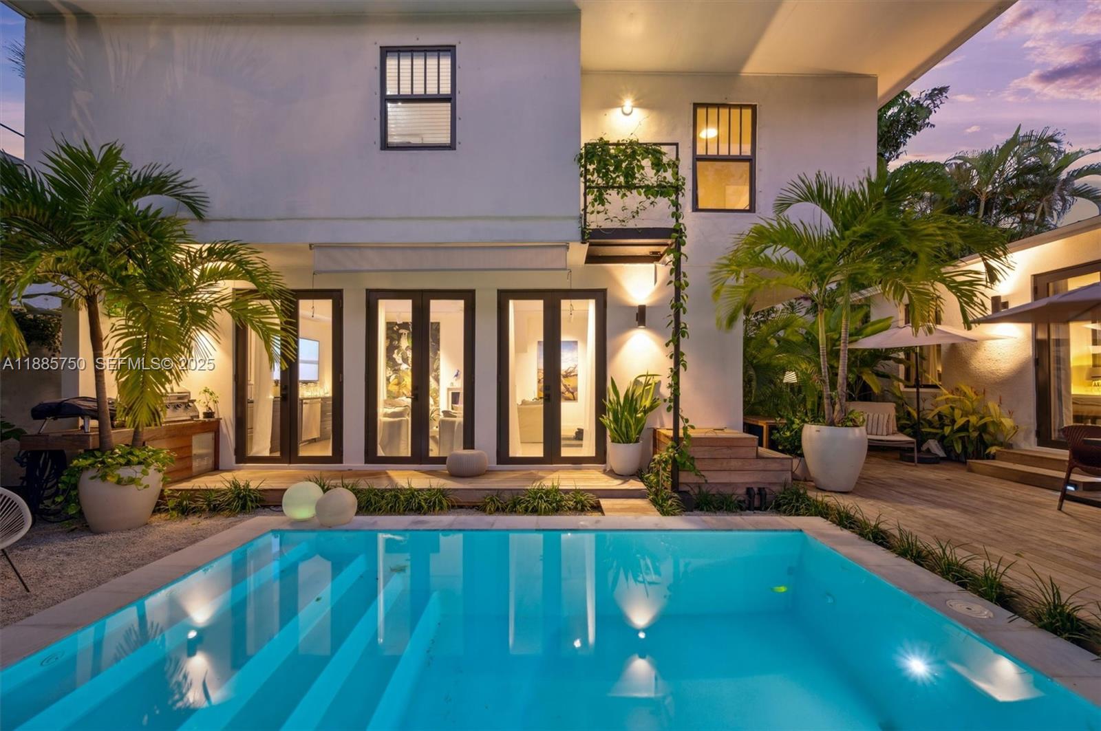 135 Northeast 45th Street Miami, FL 33137 - Photo 46 of 48 a view of swimming pool with outdoor seating