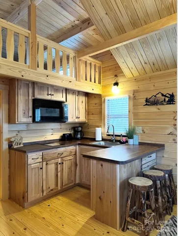 a kitchen with a sink and cabinets