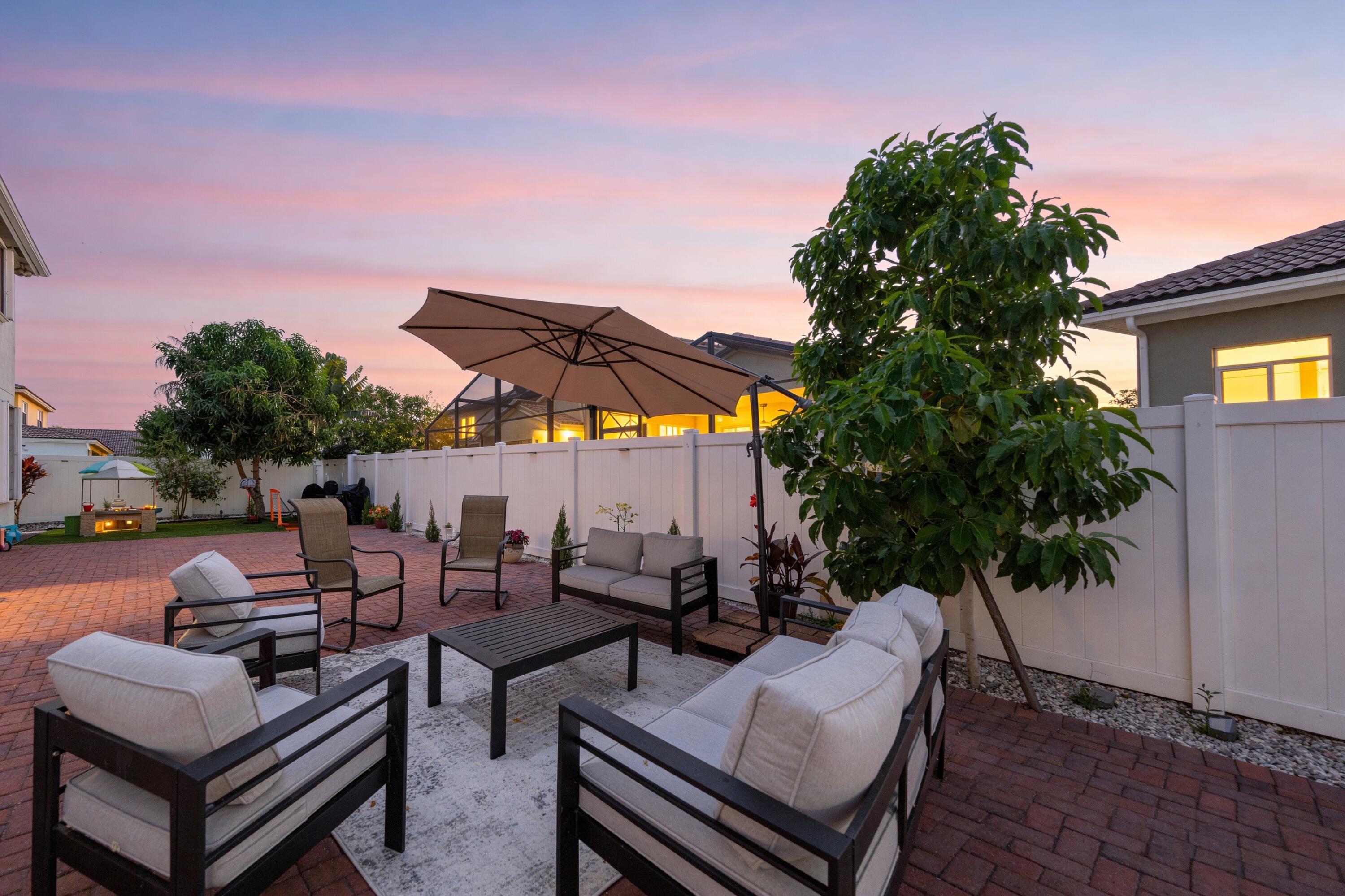 18037 Mambo Drive Boca Raton, FL 33496 - Photo 2 of 56 Twilight Backyard Photo