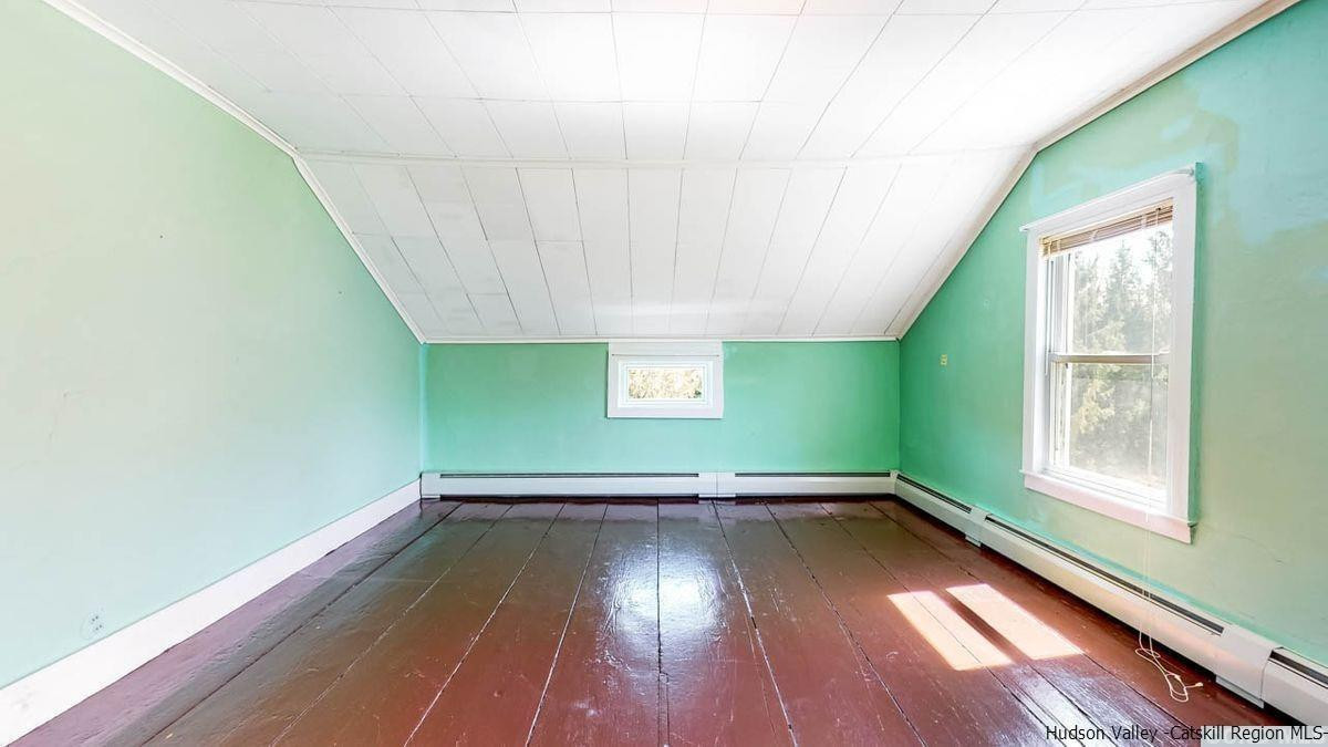 53 Pine Valley Road Greenville, NY 12083 - Photo 11 of 35 a view of a room with wooden floor and window