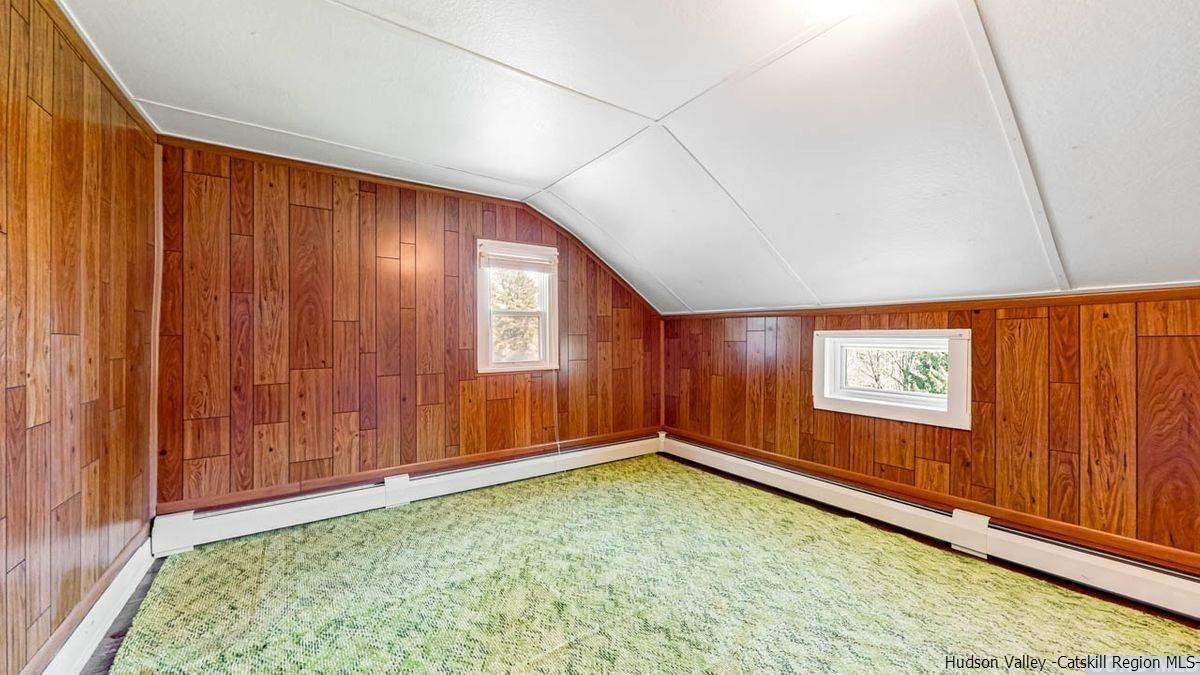 53 Pine Valley Road Greenville, NY 12083 - Photo 12 of 35 a view of an empty room with window and stairs