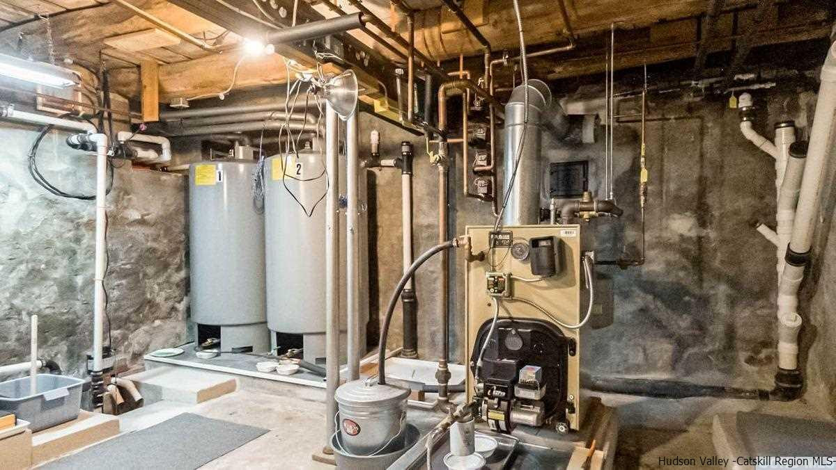 53 Pine Valley Road Greenville, NY 12083 - Photo 14 of 35 a bathroom with a mirror and shower