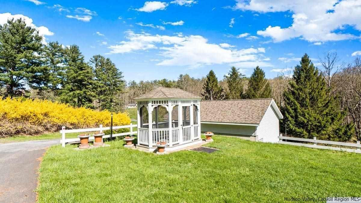 53 Pine Valley Road Greenville, NY 12083 - Photo 18 of 35 a view of a house with pool and a yard