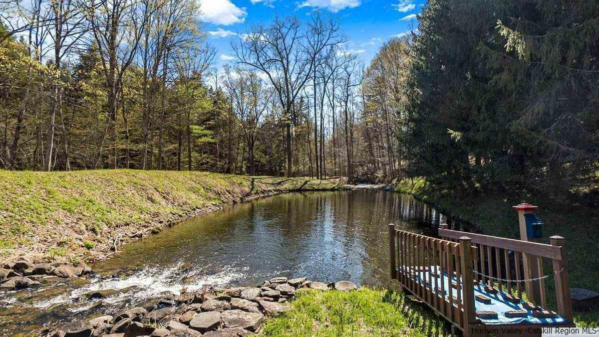 53 Pine Valley Road Greenville, NY 12083 - Photo 2 of 35 a view of a lake with a yard