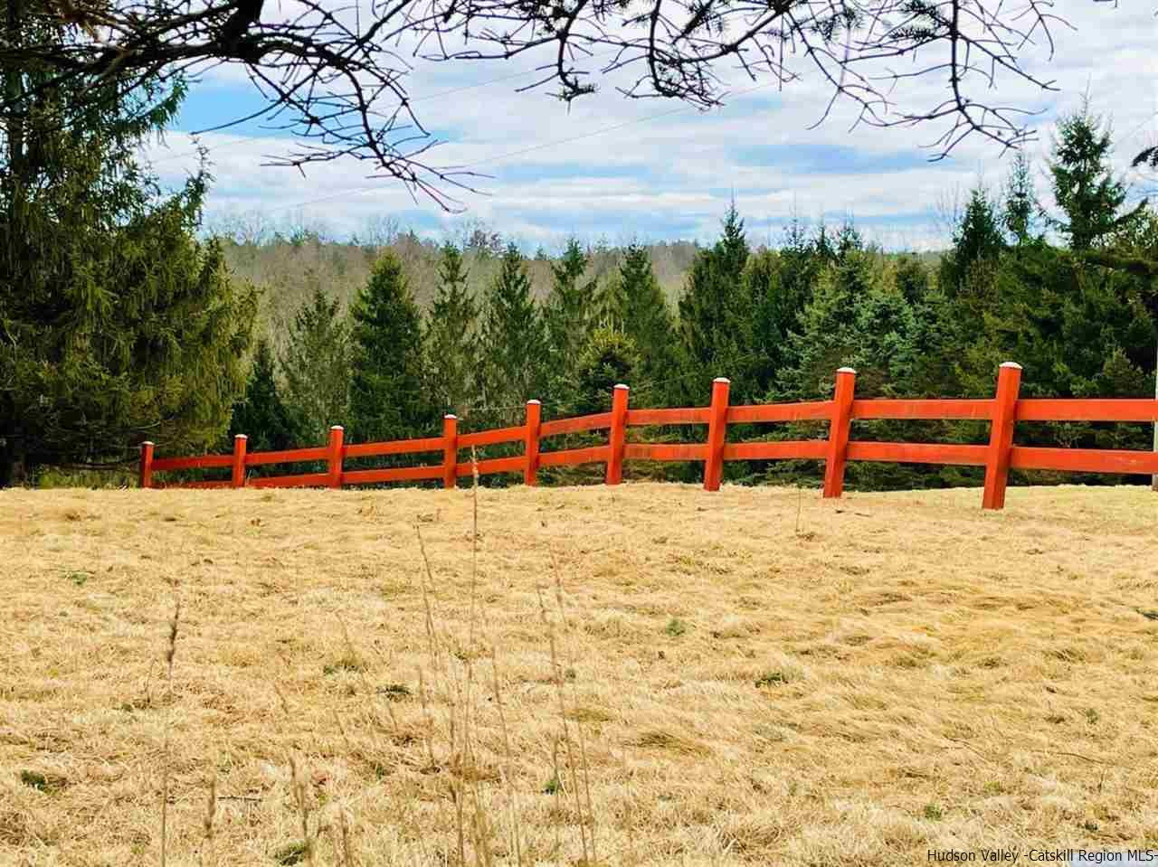 53 Pine Valley Road Greenville, NY 12083 - Photo 23 of 35 a view of outdoor space with deck and trees