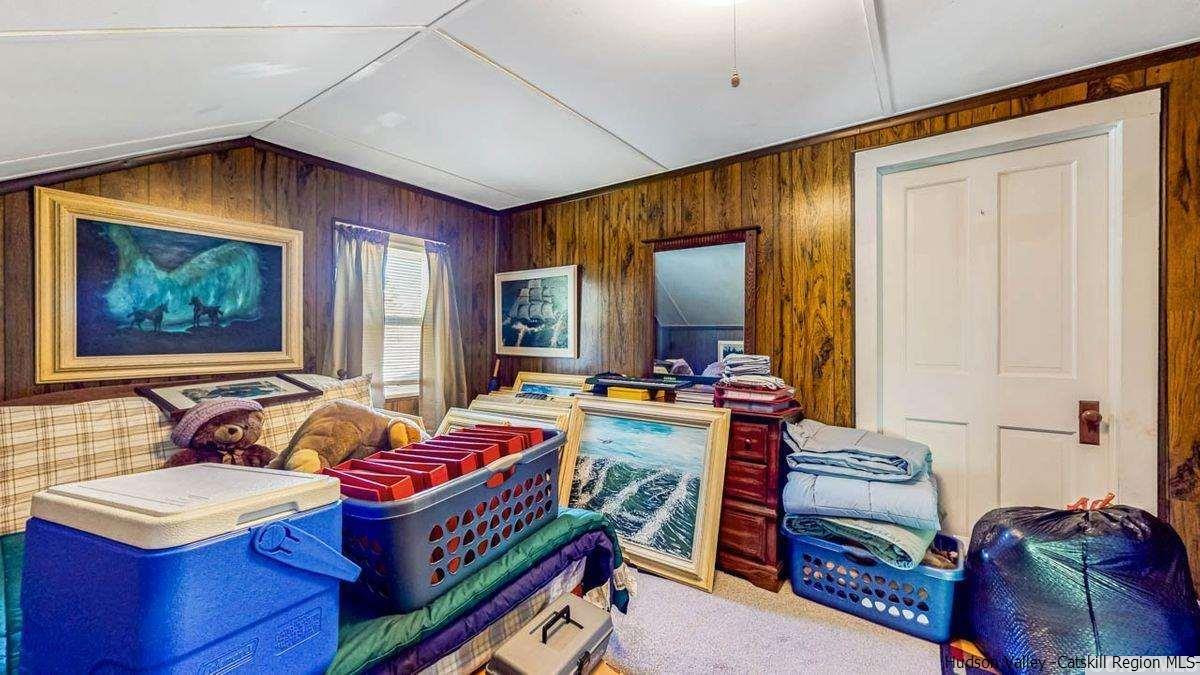 53 Pine Valley Road Greenville, NY 12083 - Photo 33 of 35 a living room with furniture and a window