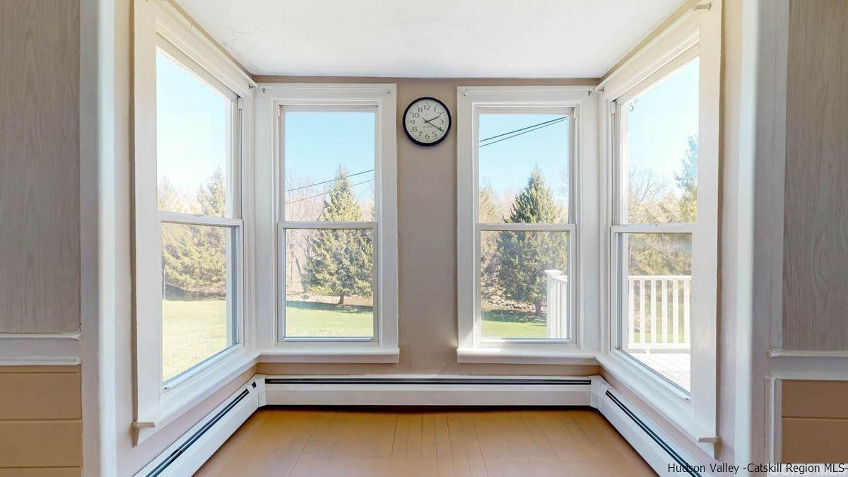 53 Pine Valley Road Greenville, NY 12083 - Photo 9 of 35 a view of a room with large windows