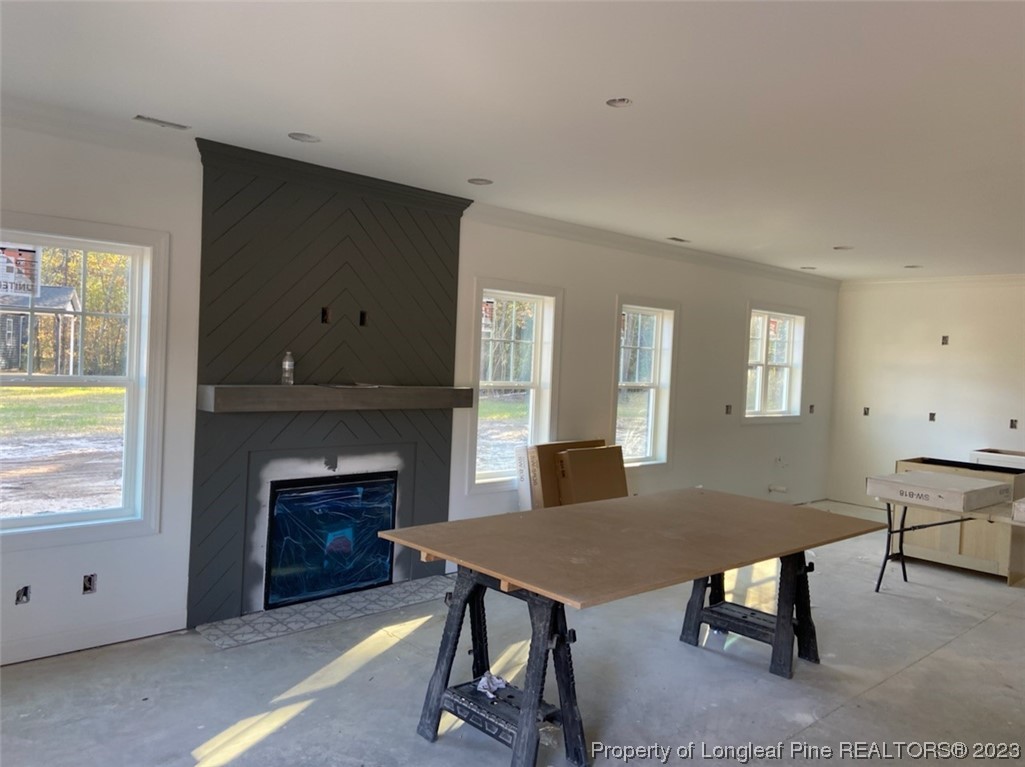141 Sears Drive Cameron, NC 28326 - Photo 6 of 27 a view of a livingroom with furniture and a fireplace