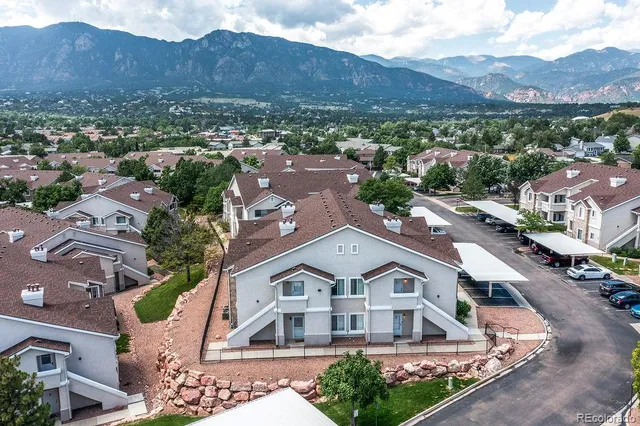 an aerial view of residential houses and trees