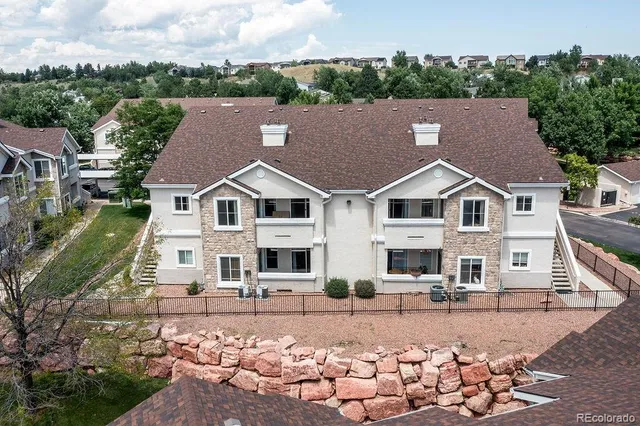 a view of house with yard