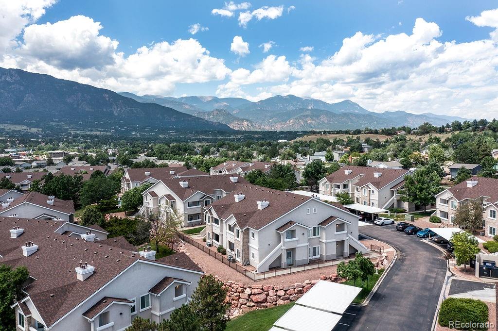 3875 Strawberry Field Grove Colorado Springs, CO 80906 - Photo 8 of 50 an aerial view of residential houses with outdoor space and city view