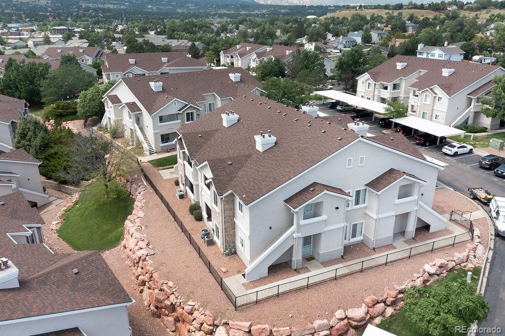 3875 Strawberry Field Grove Colorado Springs, CO 80906 - Photo 10 of 50 an aerial view of residential houses with outdoor space