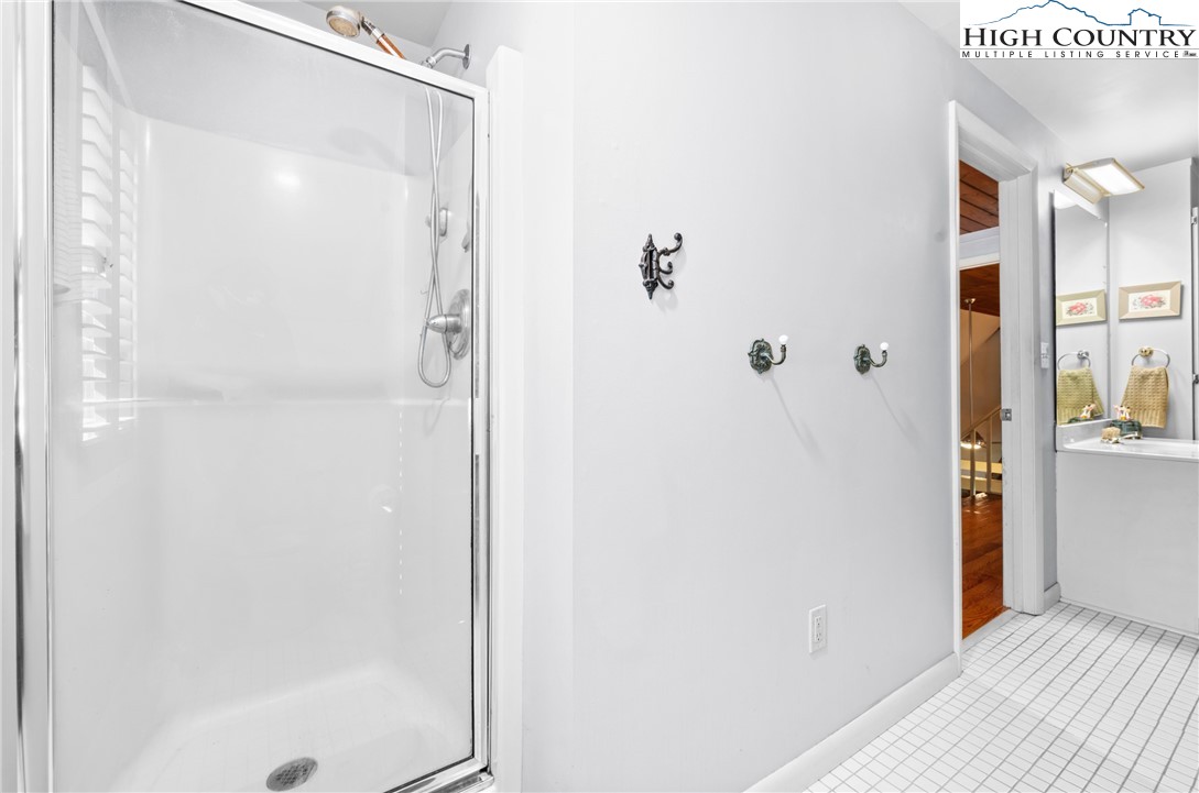 239 Deerfield Estates Road Boone, NC 28607 - Photo 19 of 45 a bathroom with a shower