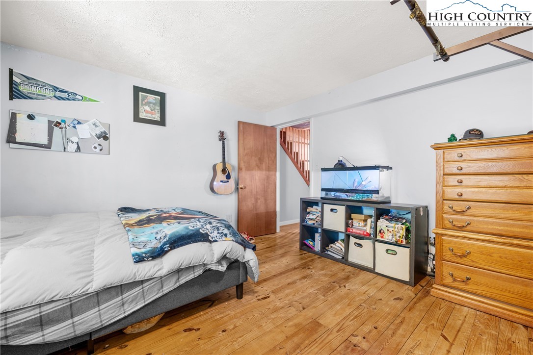 239 Deerfield Estates Road Boone, NC 28607 - Photo 29 of 45 a bedroom with a bed and closet