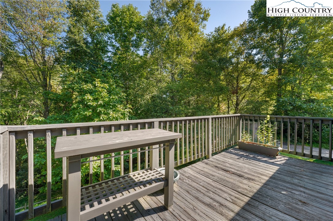 239 Deerfield Estates Road Boone, NC 28607 - Photo 33 of 45 a view of balcony with wooden floor and fence