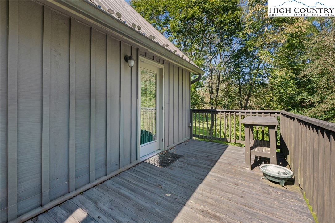 239 Deerfield Estates Road Boone, NC 28607 - Photo 34 of 45 a view of deck with wooden floor and seating space