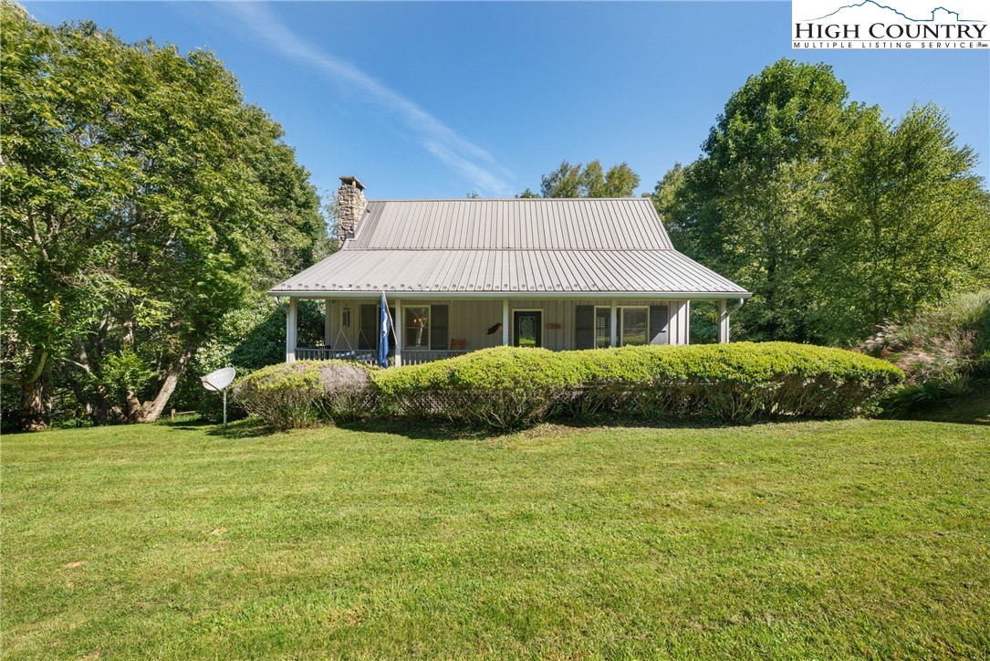 239 Deerfield Estates Road Boone, NC 28607 - Photo 44 of 45 a view of a house with a yard
