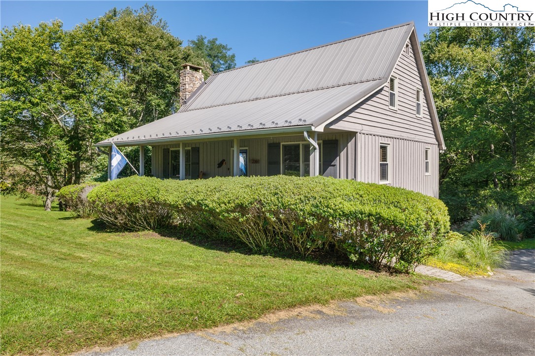 239 Deerfield Estates Road Boone, NC 28607 - Photo 45 of 45 a view of a house with a garden