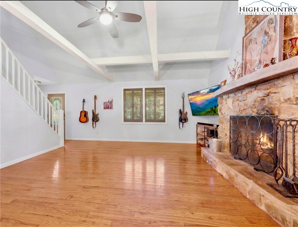 239 Deerfield Estates Road Boone, NC 28607 - Photo 8 of 45 wooden floor in an empty room with a window