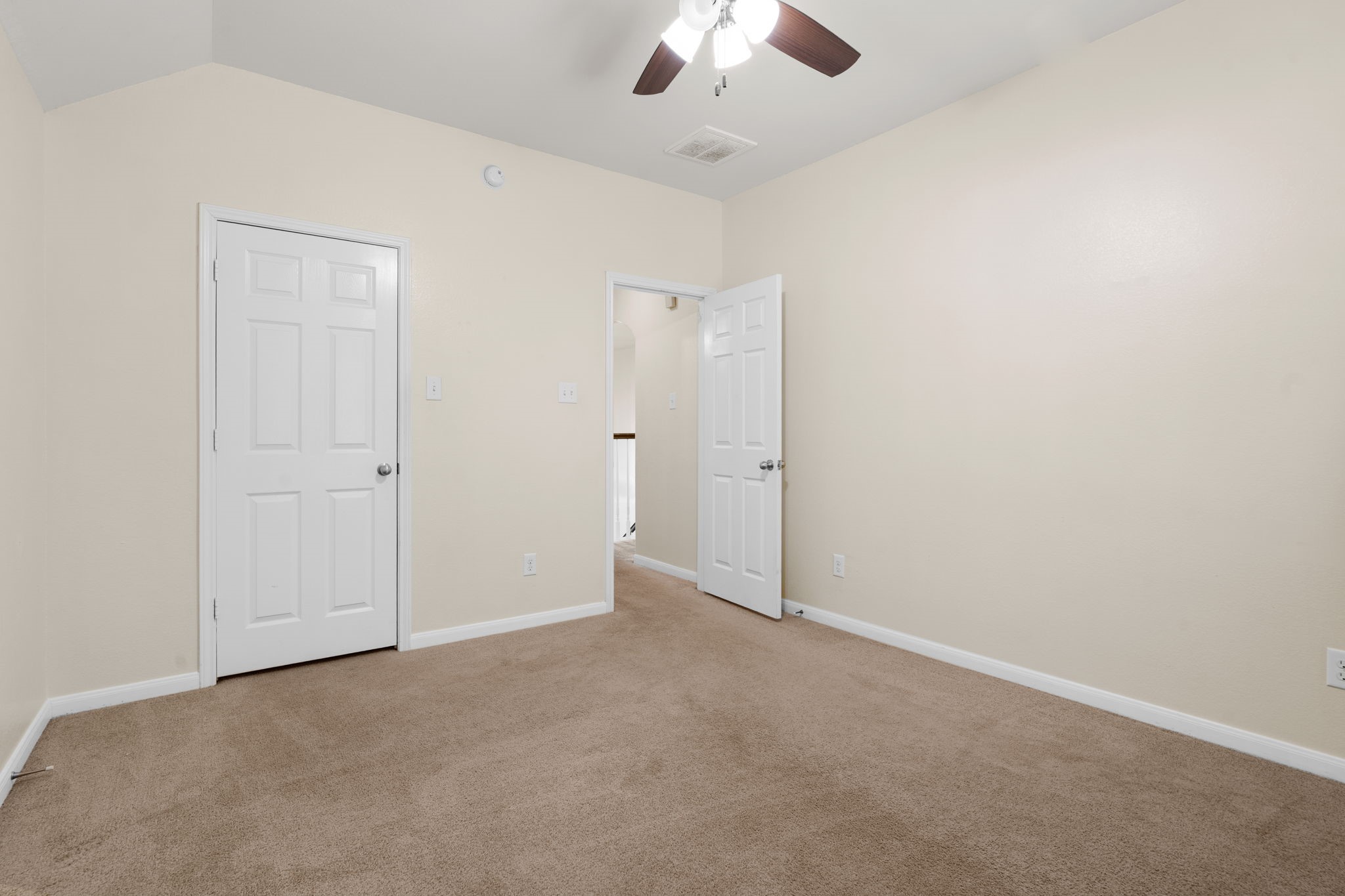 20555 Bonds Creek Lane Spring, TX 77388 - Photo 27 of 34 an empty room with chandelier fan