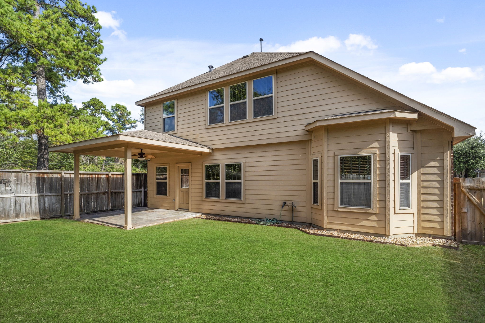 20555 Bonds Creek Lane Spring, TX 77388 - Photo 3 of 34 a view of a house with a yard and sitting area