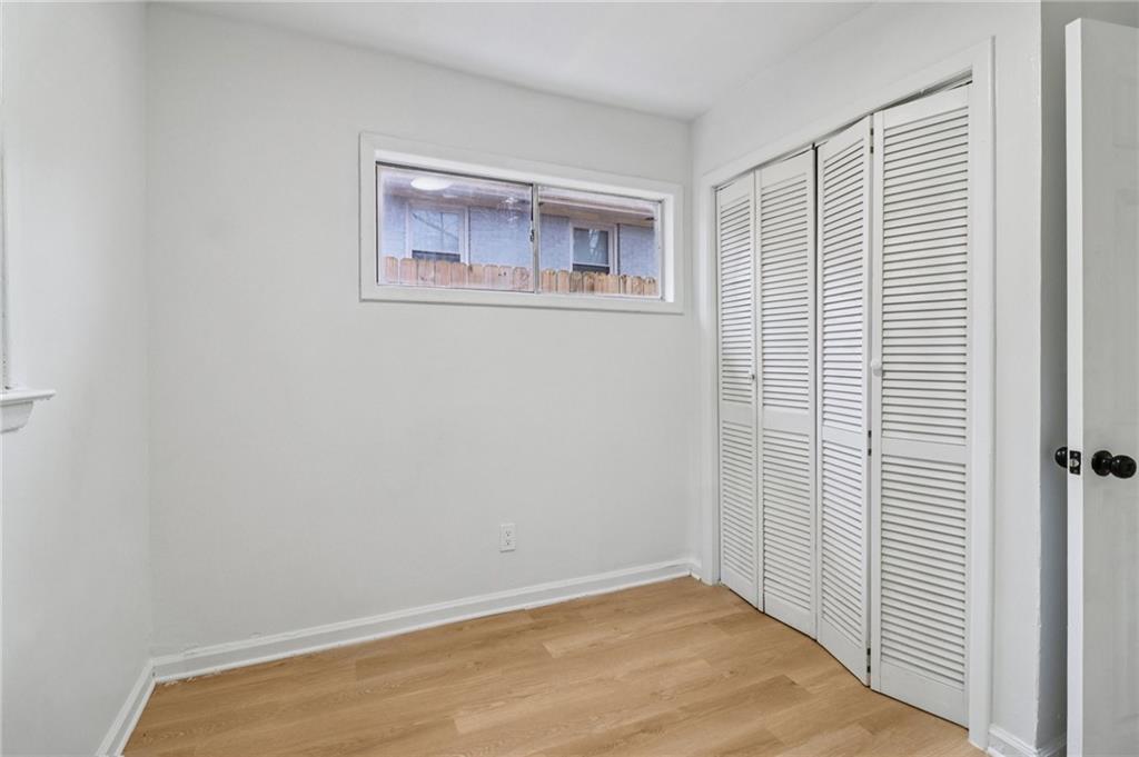 3159 Bobolink Drive Decatur, GA 30032 - Photo 16 of 37 a view of an empty room with a window