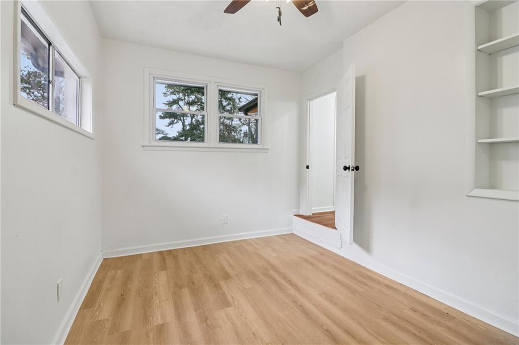 3159 Bobolink Drive Decatur, GA 30032 - Photo 17 of 37 a view of an empty room with wooden floor