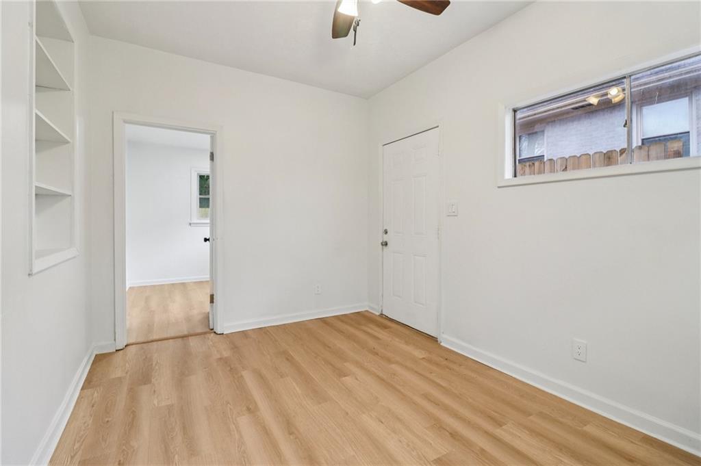 3159 Bobolink Drive Decatur, GA 30032 - Photo 18 of 37 a view of empty room with wooden floor
