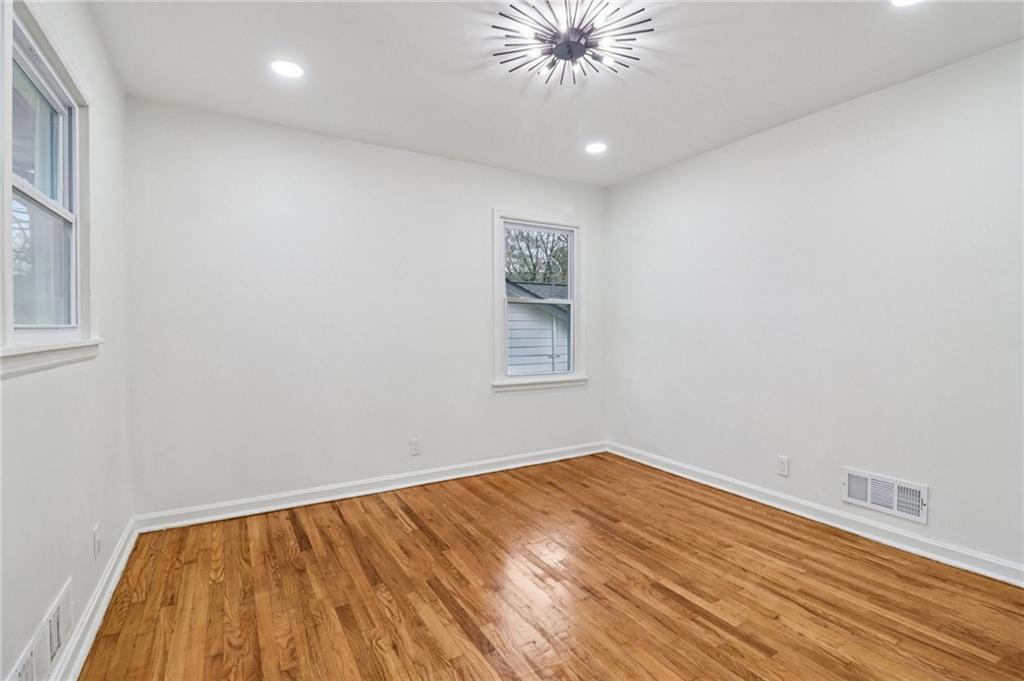 3159 Bobolink Drive Decatur, GA 30032 - Photo 19 of 37 a view of room with window and wooden floor