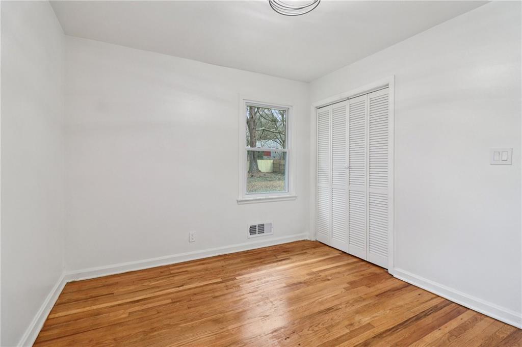3159 Bobolink Drive Decatur, GA 30032 - Photo 25 of 37 a view of empty room with wooden floor