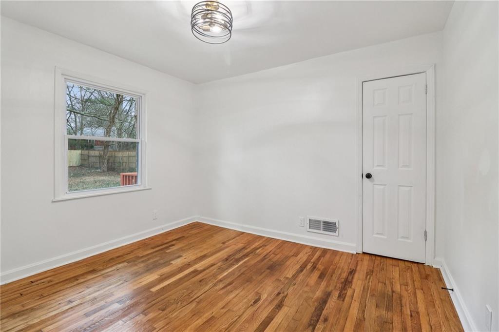 3159 Bobolink Drive Decatur, GA 30032 - Photo 30 of 37 a view of empty room with wooden floor