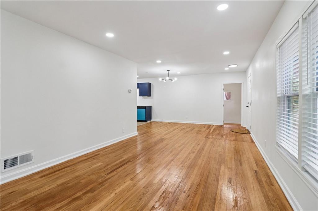 3159 Bobolink Drive Decatur, GA 30032 - Photo 31 of 37 a view of empty room with wooden floor and fan