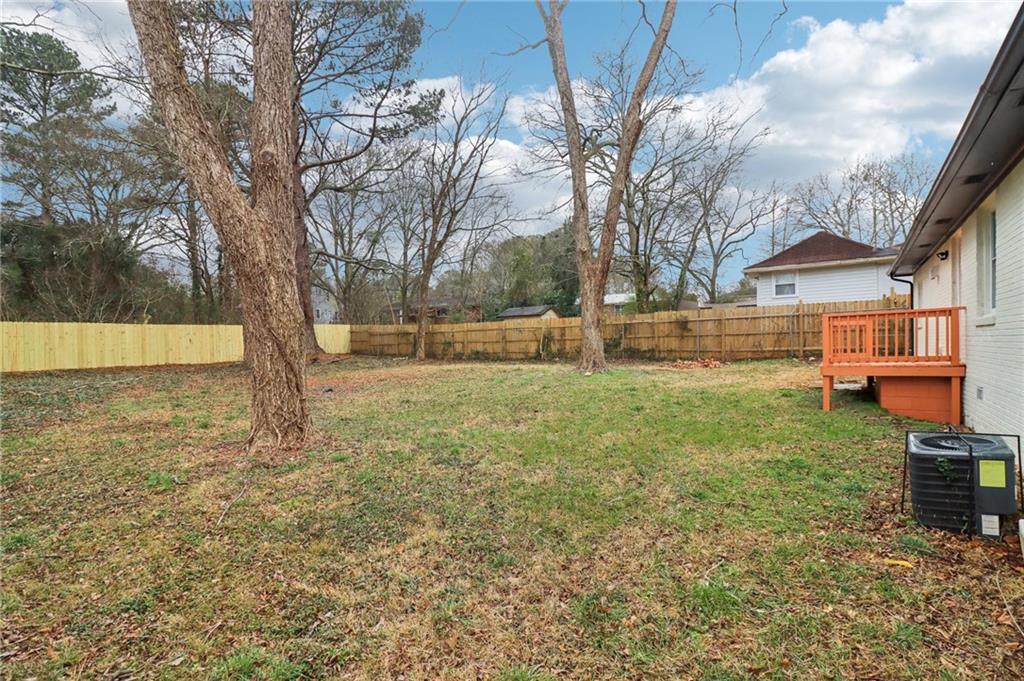 3159 Bobolink Drive Decatur, GA 30032 - Photo 37 of 37 a view of a yard with a house and large trees