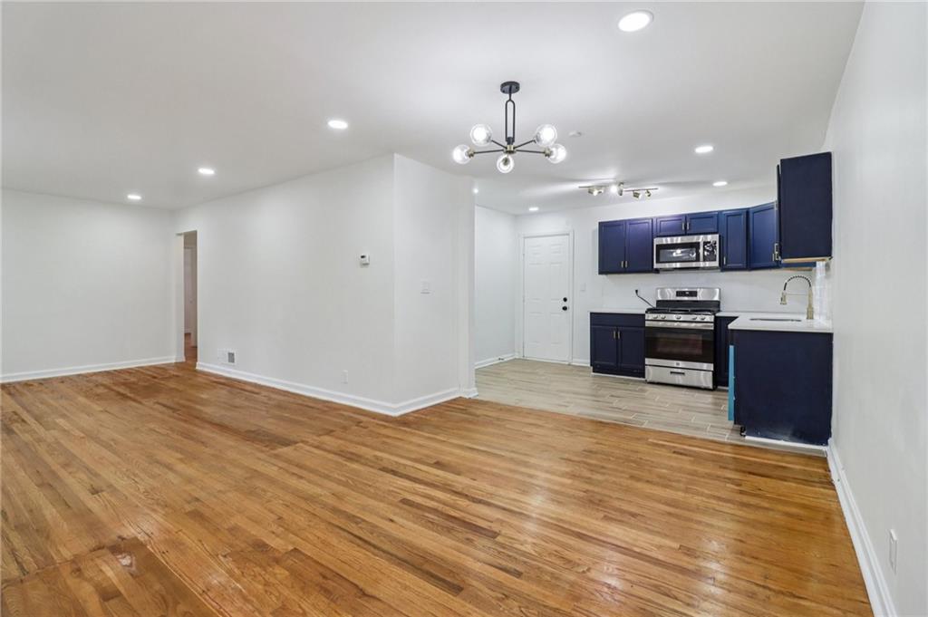3159 Bobolink Drive Decatur, GA 30032 - Photo 5 of 37 a view of kitchen with granite countertop cabinets and refrigerator