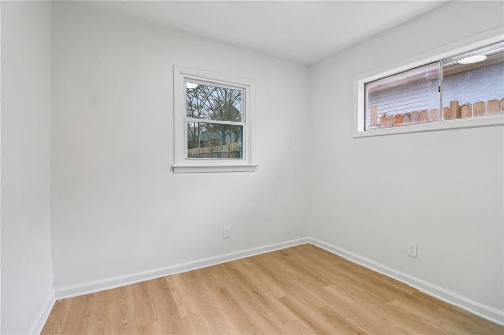 3159 Bobolink Drive Decatur, GA 30032 - Photo 8 of 37 a view of an empty room with a window