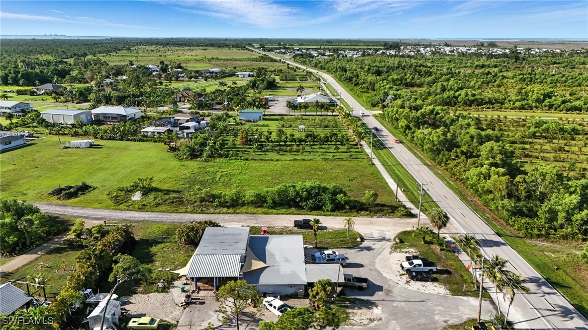 8288 Stringfellow Road St. James City, FL 33956 - Photo 8 of 20 an aerial view of a house with a yard