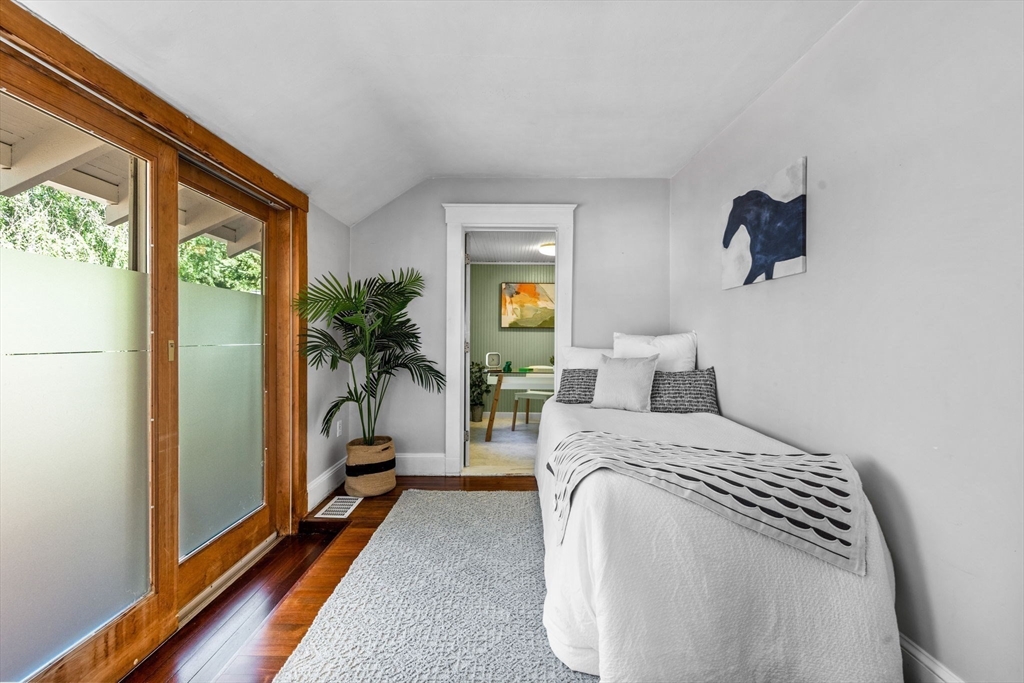92 Old Connecticut Path Framingham, MA 01701 - Photo 15 of 24 a bedroom with a bed and large windows