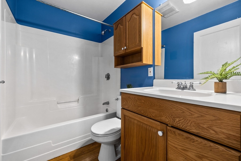 92 Old Connecticut Path Framingham, MA 01701 - Photo 17 of 24 a bathroom with a sink a toilet and shower