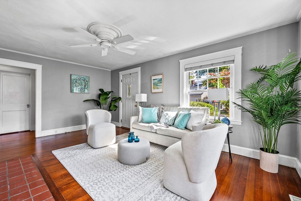 92 Old Connecticut Path Framingham, MA 01701 - Photo 3 of 24 a living room with furniture potted plant and a window