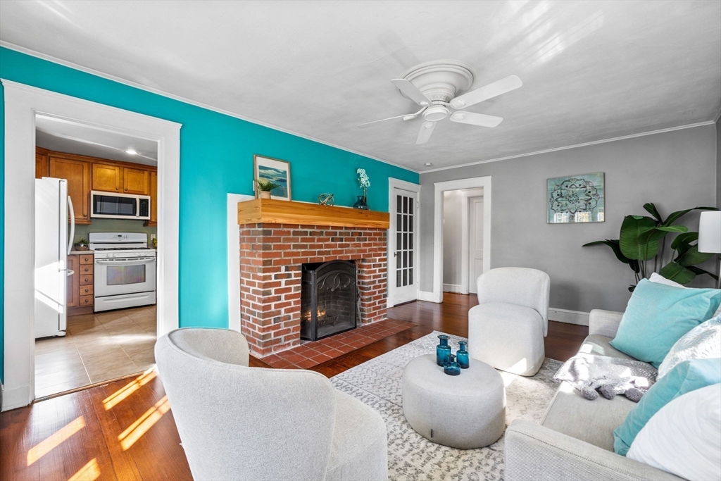 92 Old Connecticut Path Framingham, MA 01701 - Photo 5 of 24 a living room with furniture and a fireplace