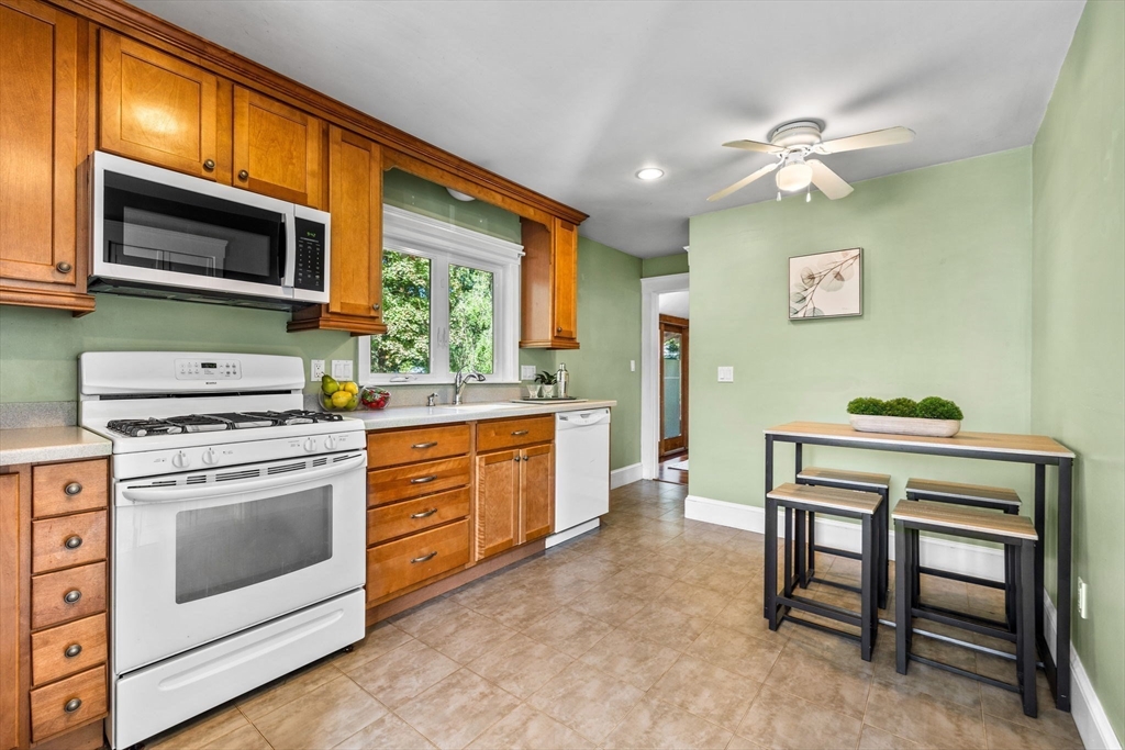 92 Old Connecticut Path Framingham, MA 01701 - Photo 6 of 24 a kitchen with a stove cabinets and a microwave