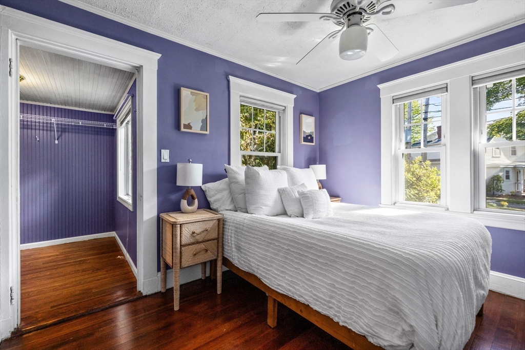 92 Old Connecticut Path Framingham, MA 01701 - Photo 10 of 24 a bedroom with a bed and wooden floor