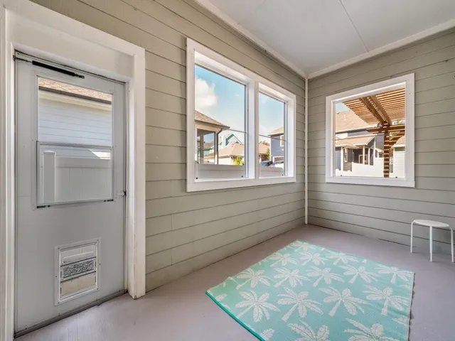 a room with a bed and a window