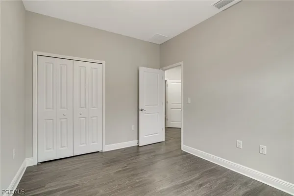 wooden floor and closet in a empty room